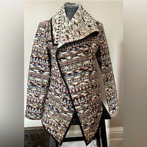 Kenar Wrap jacket with matching asymmetrical mini skirt